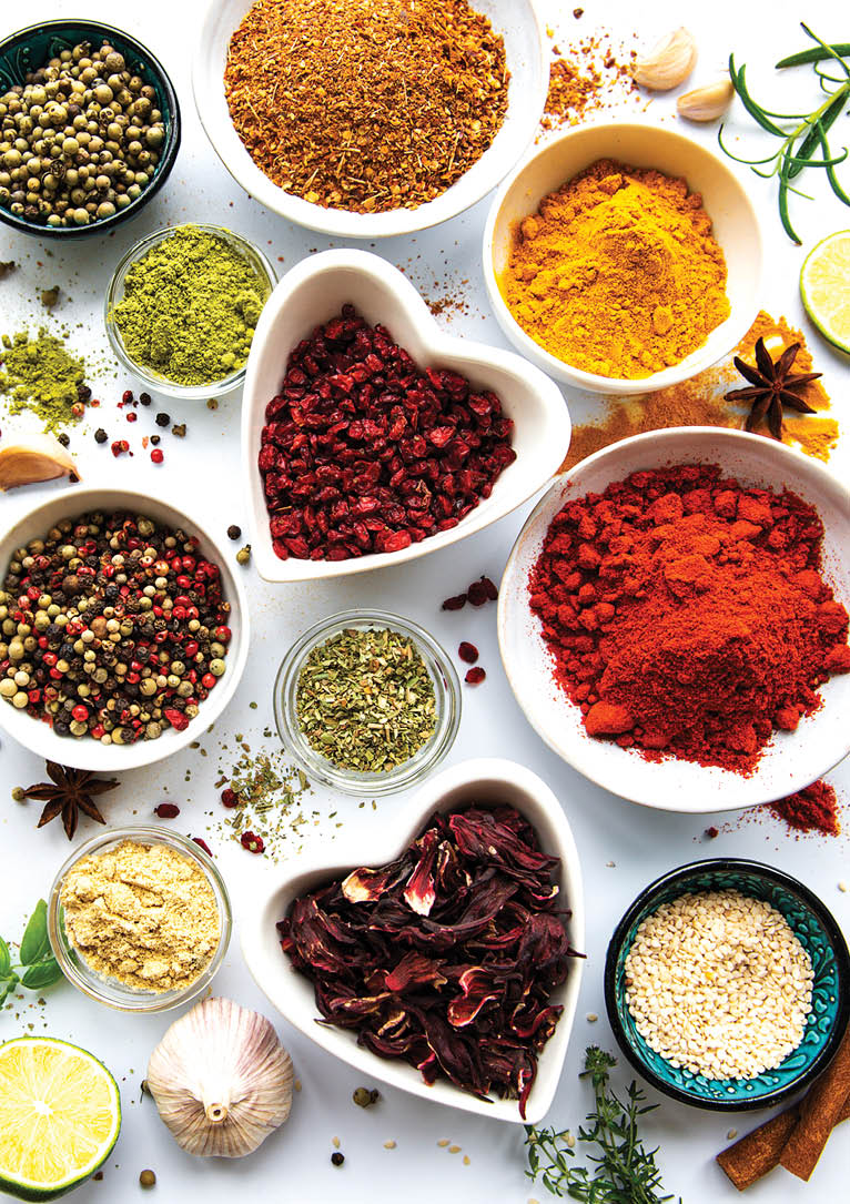 Various spices in a bowls  on white  background  Top view copy space 