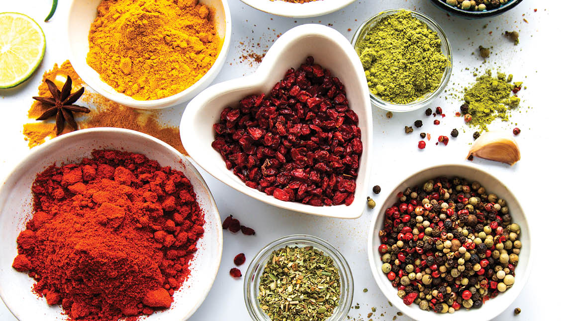 Various spices in a bowls  on white  background  Top view copy space 
