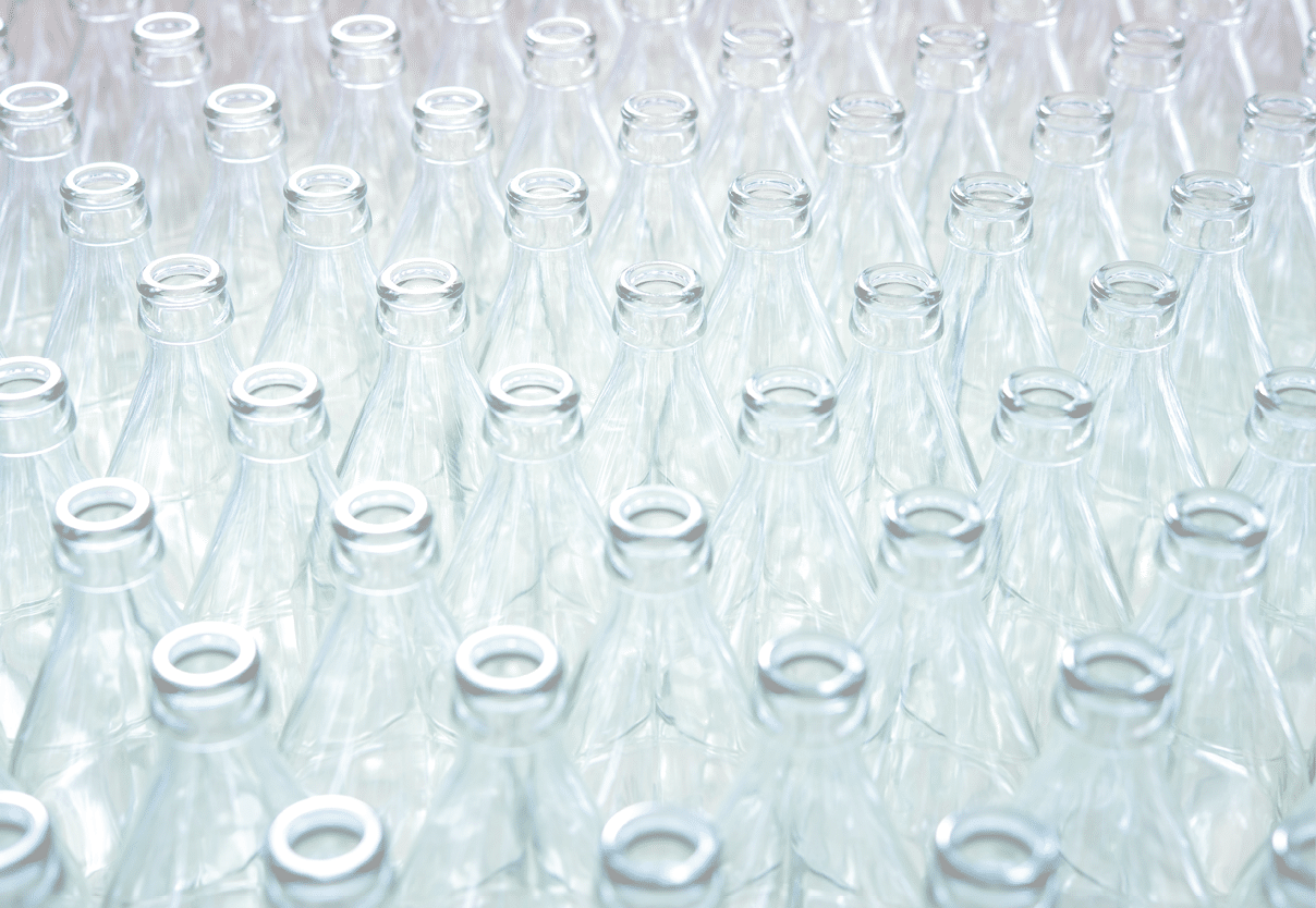 Empty glass bottles in factory to fill with drink