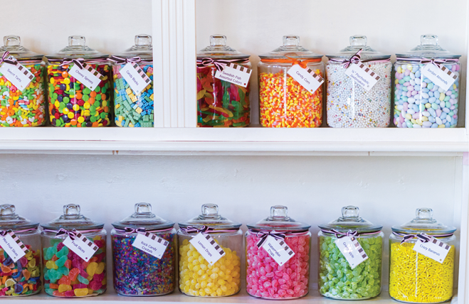 Jars filled with different candies at the boutique candy store.