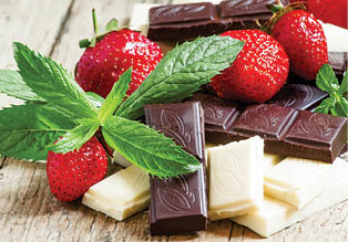 White and dark chocolate with strawberries and mint on an old wooden table, selective focus; Shutterstock ID 289212284; purchase_order: Beneo; job: Marketing; other: Tools