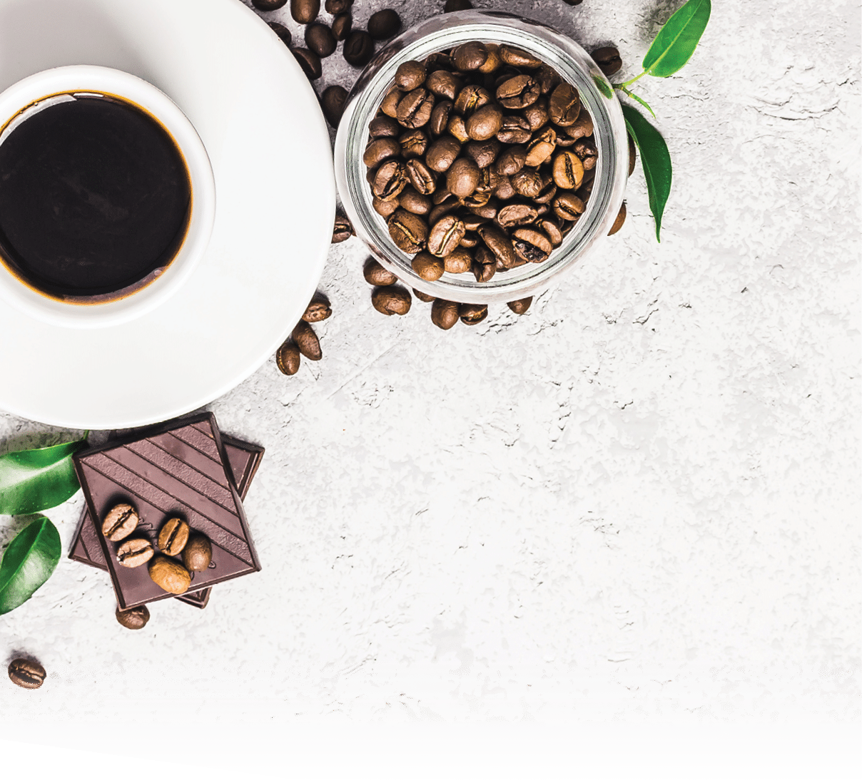 Black coffee in white cup, chocolate and coffee beans in glass jar on concrete background. Top view, space for text.