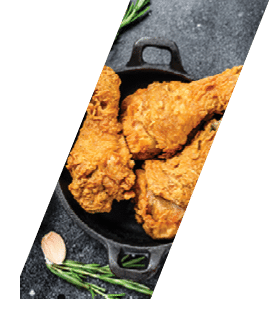 Spicy Deep Fried Breaded Chicken drumsticks. Black background. Top view. Copy space